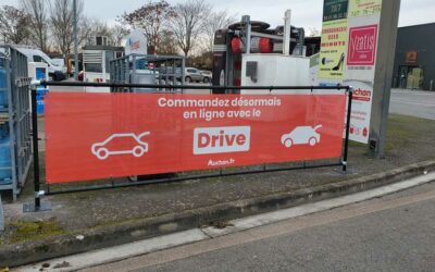 Bâche publicitaire réalisée pour le Drive de Auchan par FK Pub